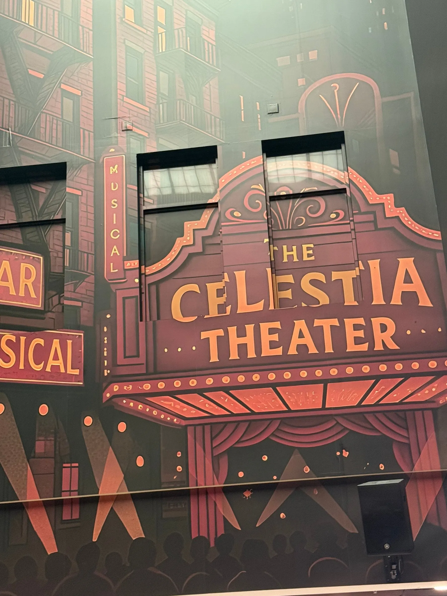 The painted Celestia Theater marquee mural inside Flame